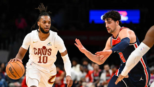 Feb 7, 2024; Washington, District of Columbia, USA; Cleveland Cavaliers guard Darius Garland (10) dribbles as Washington Wizards forward Deni Avdija (8) defends during the first half at Capital One Arena. Mandatory Credit: Brad Mills-USA TODAY Sports